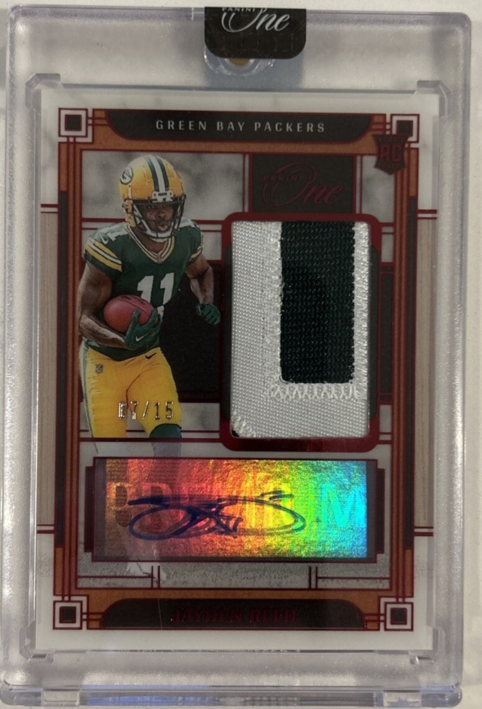 2023 Jayden Reed Panini One Rookie Red Premium Patch Autograph/15 Encased