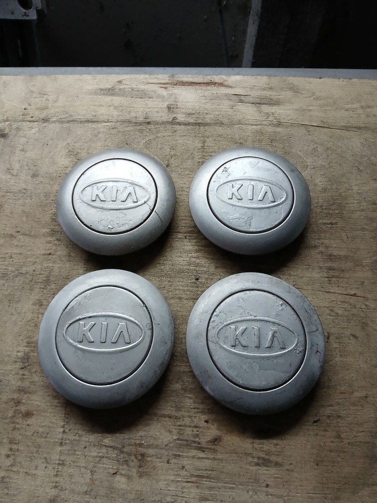 Genuine Set of 4 KIA Sorento Sportage Serena Sedona alloy wheel centre caps..