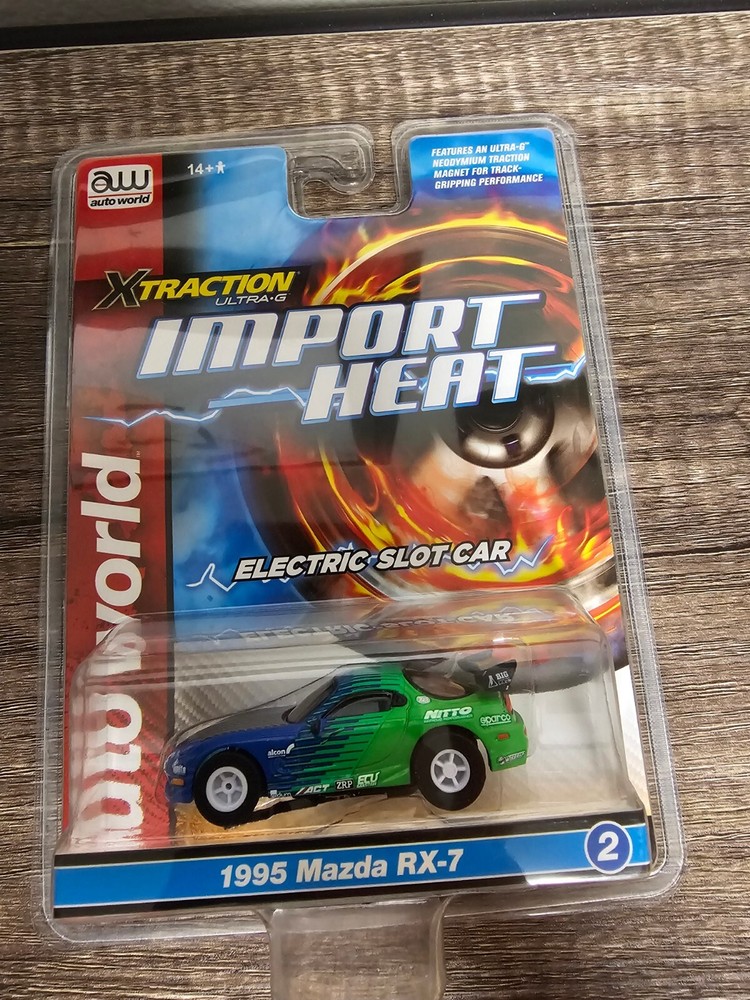 Autoworld HO Slot Car New Import Heat X Traction 1995 Mazda RX7