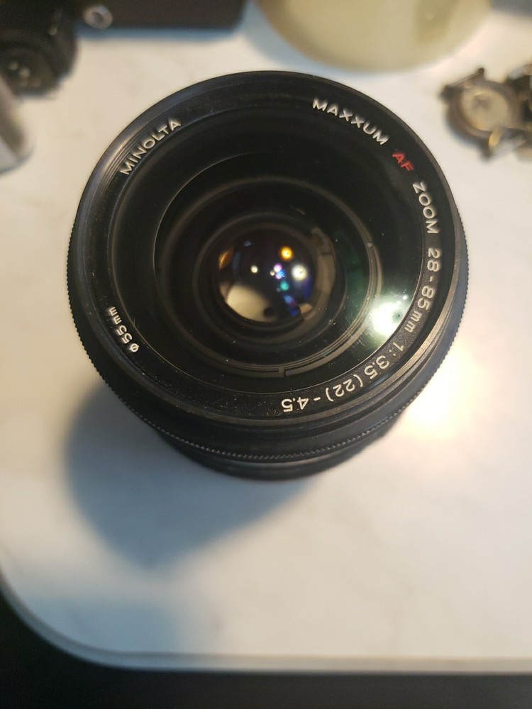 Minolta Maxxum AF 28-85mm f/3.5-4.5 Zoom Lens with 55mm Canon Adapter & Bonus Accessories