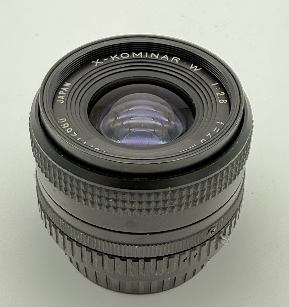 X-Kominar. W DM 28mm f/2.8 wide angle lens Fujica X mount Japan No. 112660