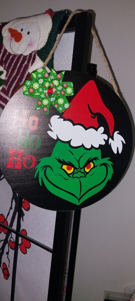 Elevate your holiday decor with this charming handmade wooden Grinch sign!
