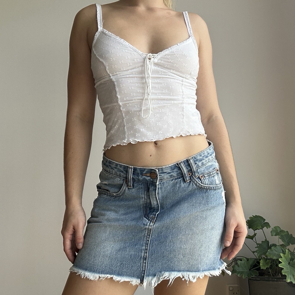 Women's Light Wash Distressed Denim Mini Skirt with Fray Hem
