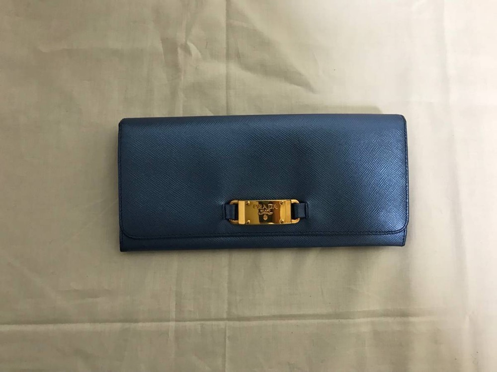 Prada Saffiano genuine leather bifold wallet in light blue for business