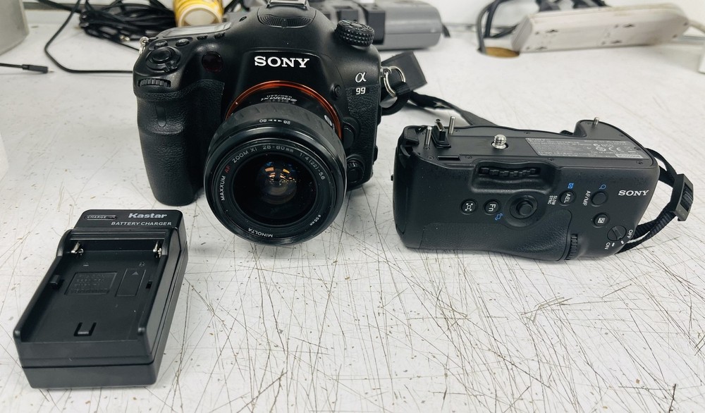 Sony Alpha SLT-A99 Digital SLR Camera + lens+Vertical grip+battery+charger