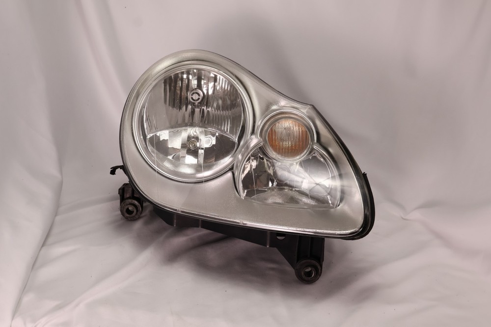 2003-2006 PORSCHE CAYENNE RIGHT SIDE HEADLIGHT HALOGEN OEM WITH MOUNTING BRACKET