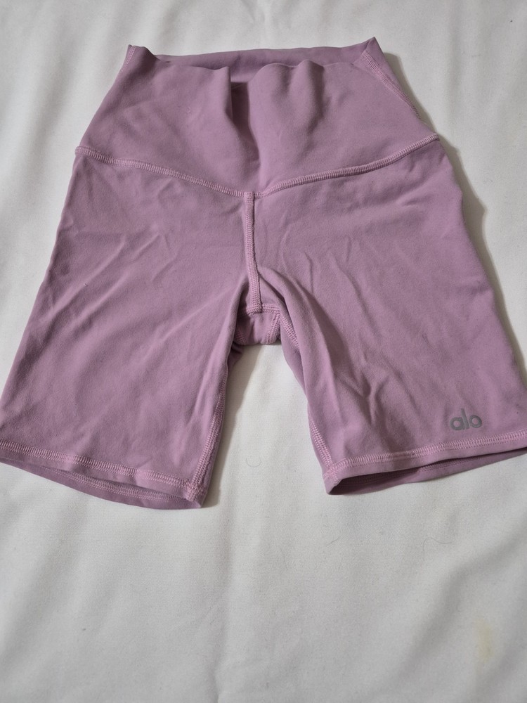 Alo Yoga High-Waist Biker Shorts, likely in a pink or lavender color XXS
