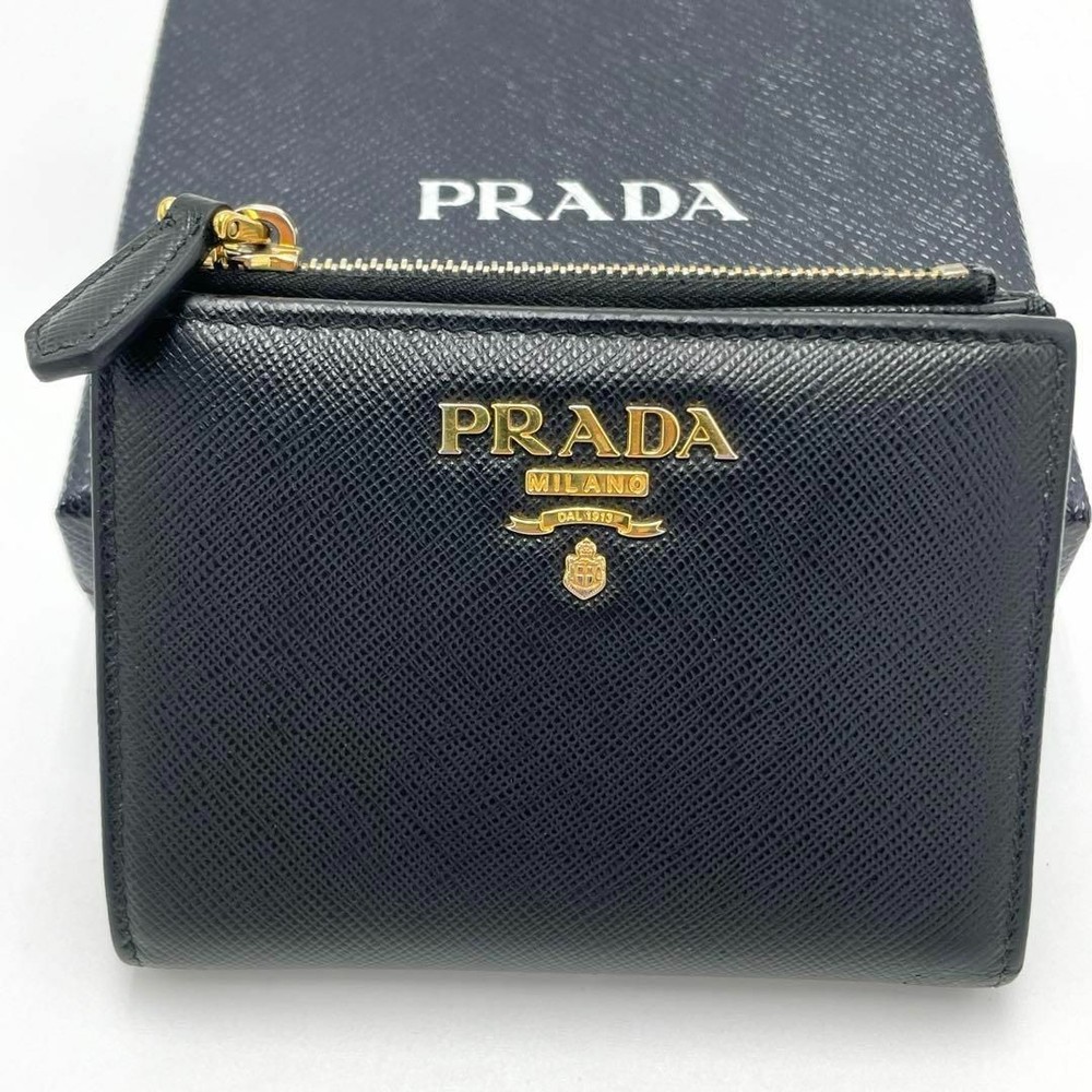PRADA Saffiano Leather Bifold Wallet in Black with Metal Accents 1ML023 Excellent Condition