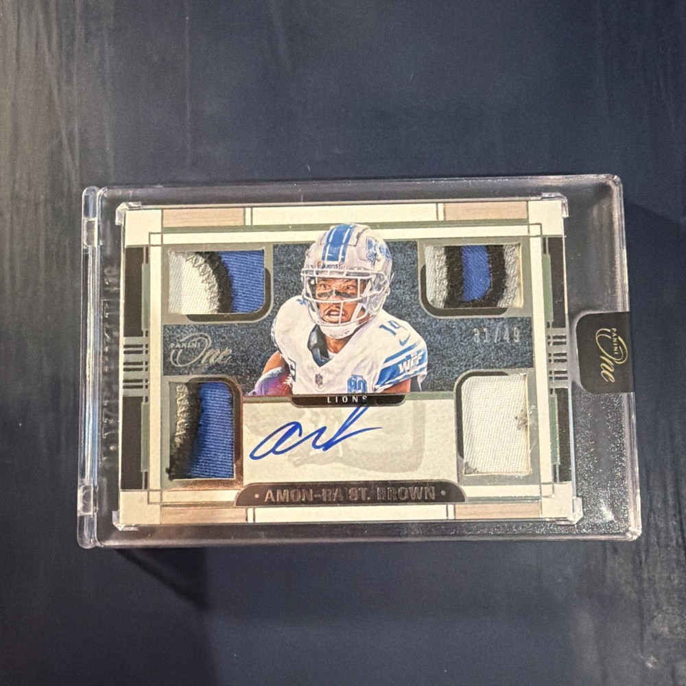 2023 Panini One Quad Patch Auto Autograph  Amon-Ra St. Brown 31/49