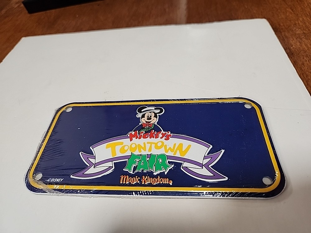 Disney MICKEY'S TOONTOWN FAIR  Magic Kingdom bicycle license plate Brand New