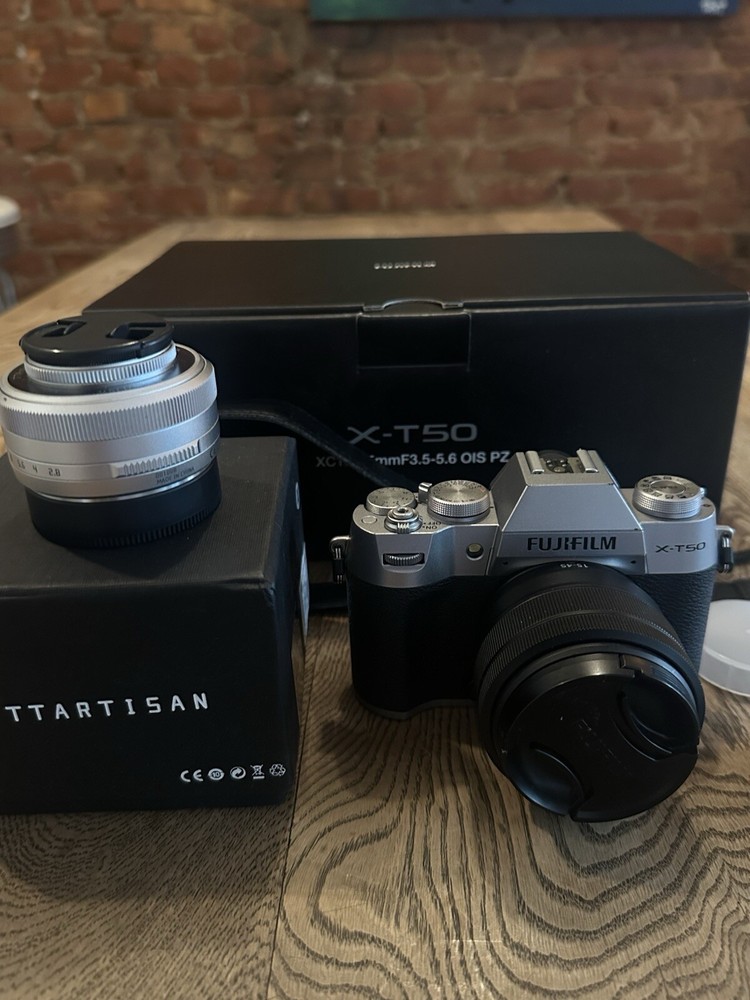 Silver Fujifilm X-t50 With Fujifilm xc15-44mm Lens  and TTArtisan AFmmf2.8 Lens