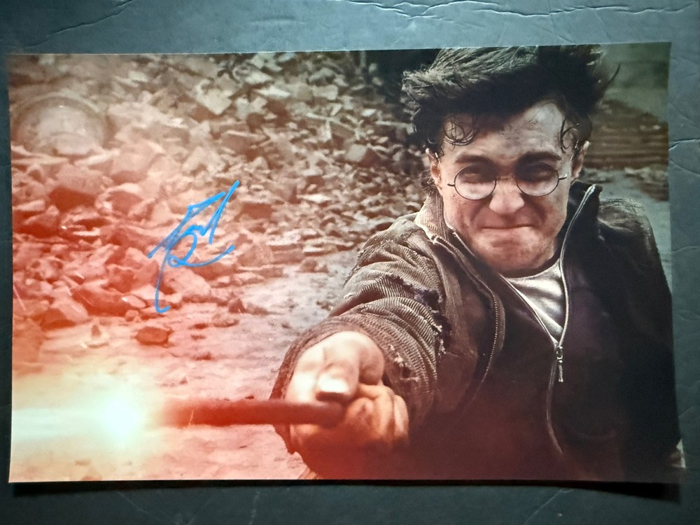 Daniel Radcliffe Autographed Harry Potter Wand 11x17 Photo Collectible