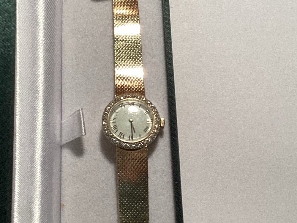 MOVADO Ladies 14k Gold Watch With DIAMOND BEZEL SELF WINDING