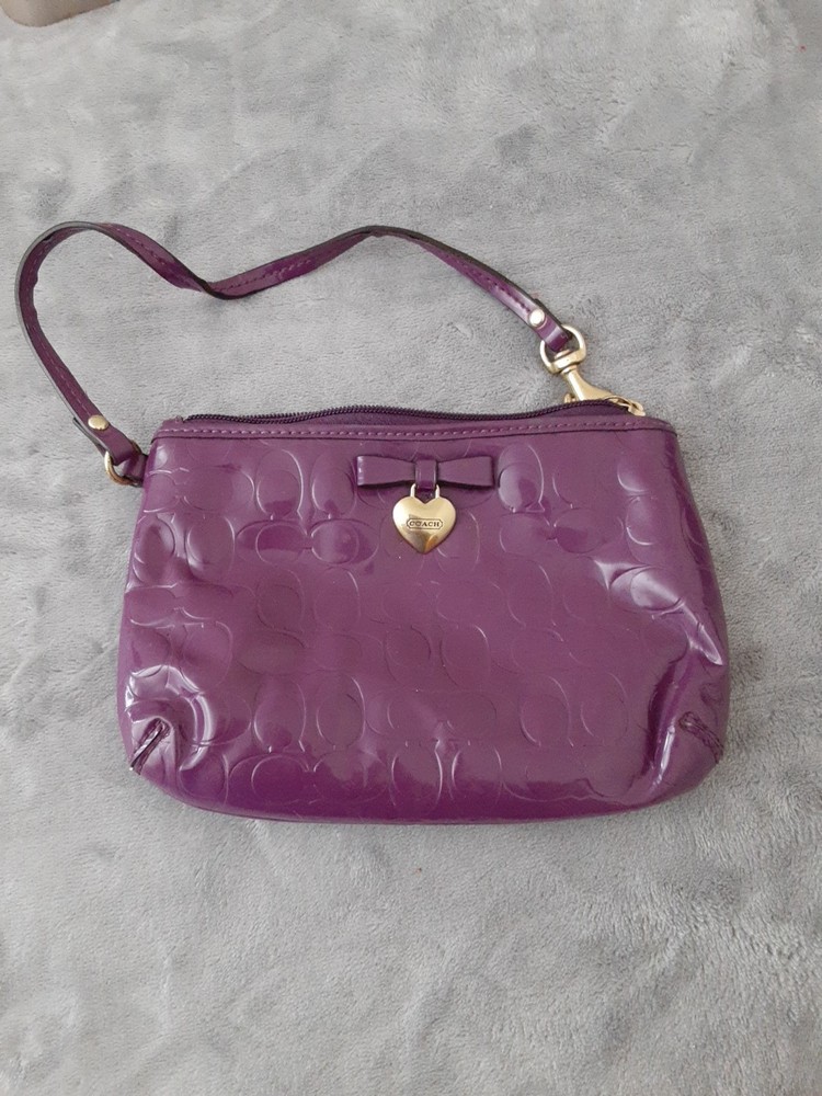 COACH Signature Embossed Liquid Gloss Wristlet Wallet in Shiny Purple