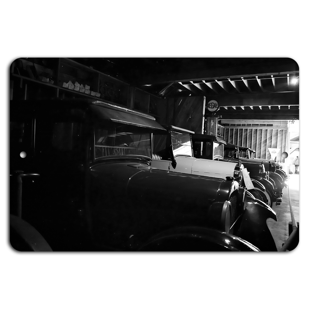 Vintage Cars in Shadowed Garage: Timeless Charm