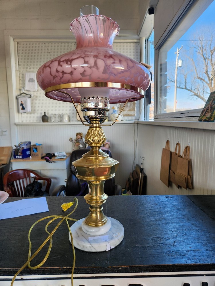 Antique brass lamp with marble base and pink glass shade
