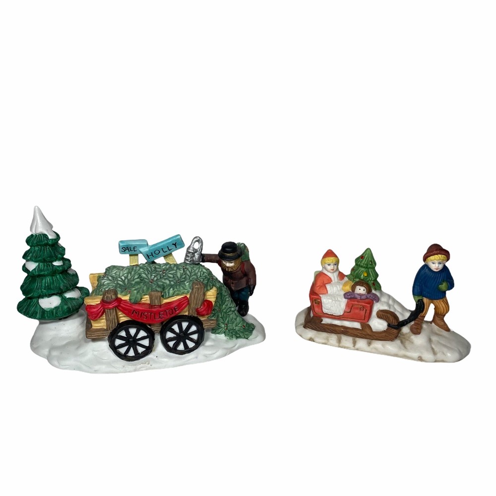 Christmas Village Sledding Figures with Holly and Mistletoe Sale-image