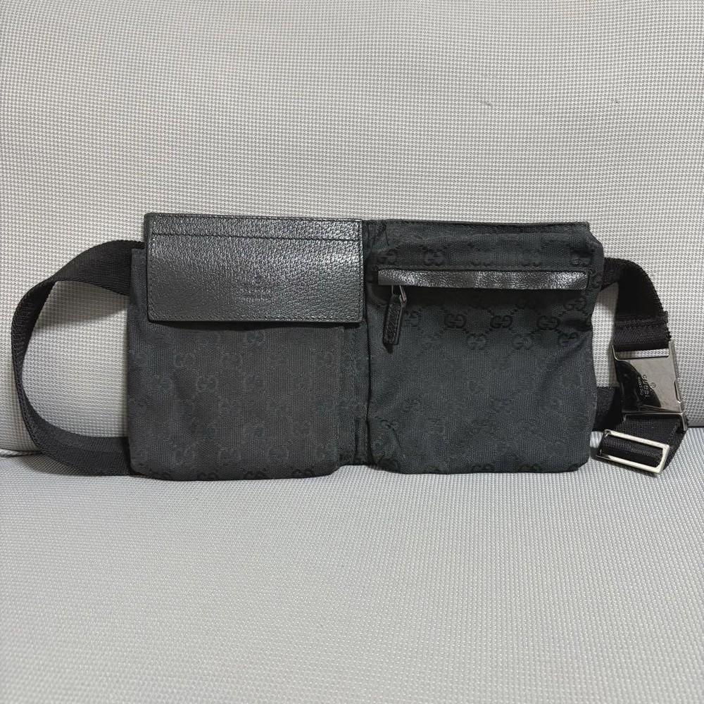 Gucci GG embossed black body bag in excellent condition