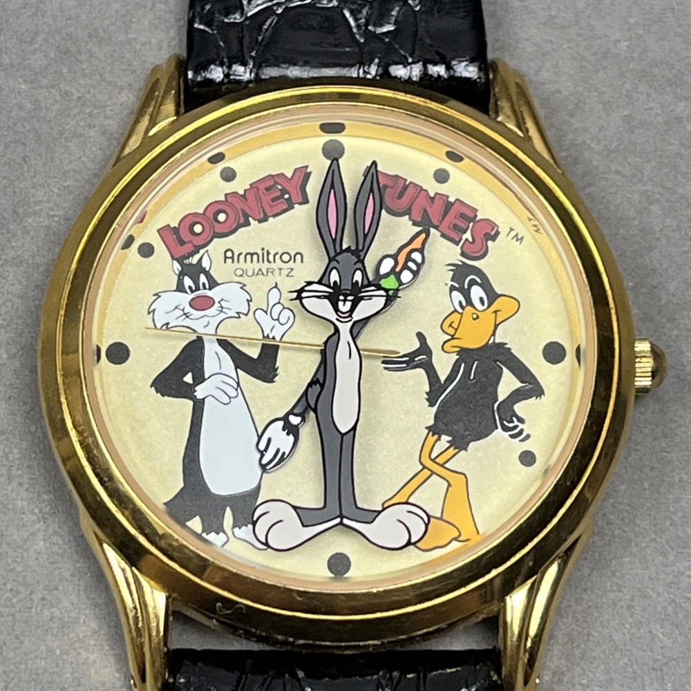 Vintage 1990s Looney Tunes Gold Tone Watch Featuring Bugs Bunny Daffy Duck Sylvester Quartz Movement