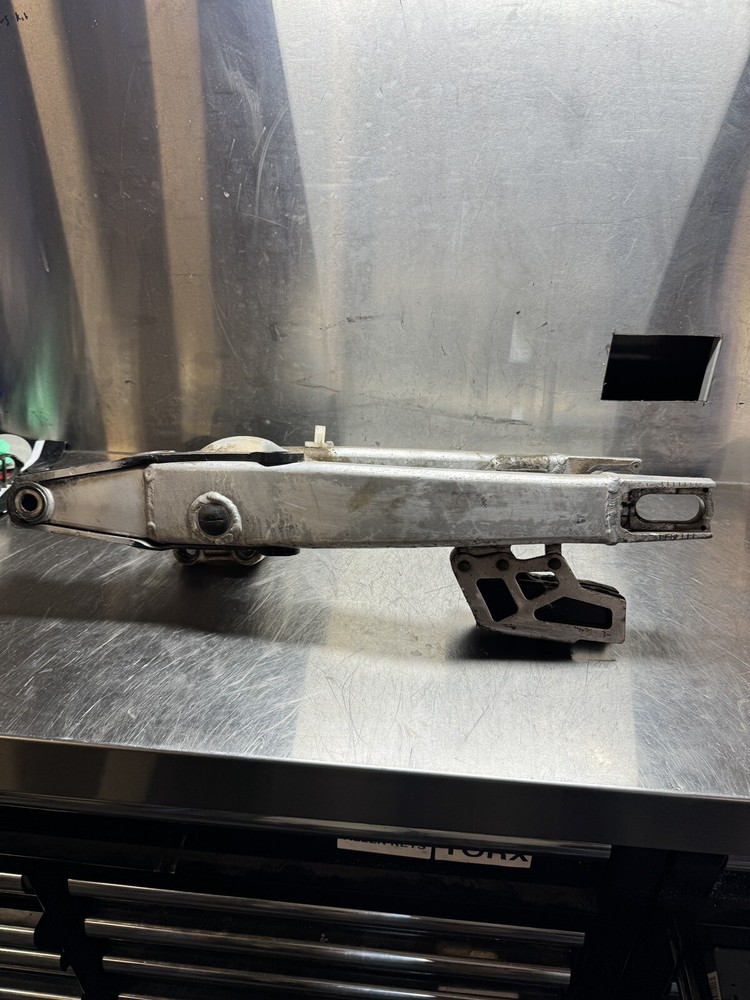 Kawasaki KX250F KX 250 F Swingarm Swing Arm Knuckle Frame OEM genuine 2005 05