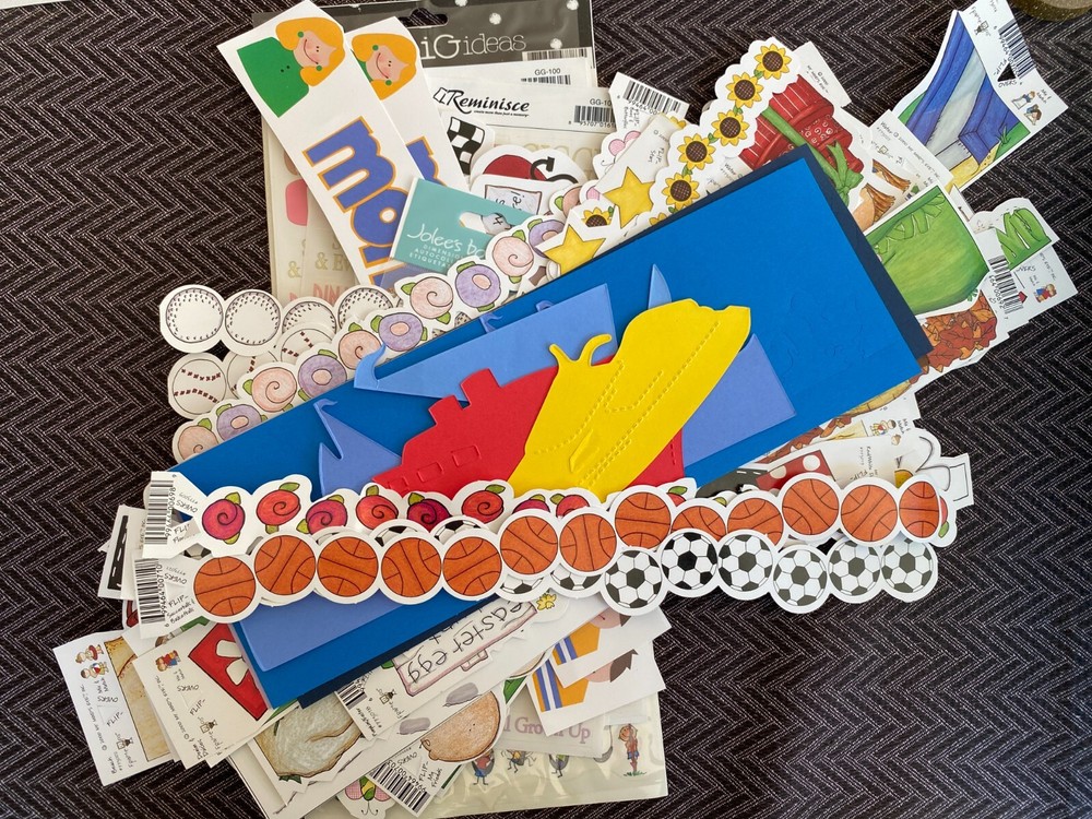 Lot of scrapbooking materials -papers, stickers, frameups, flipovers, decorative
