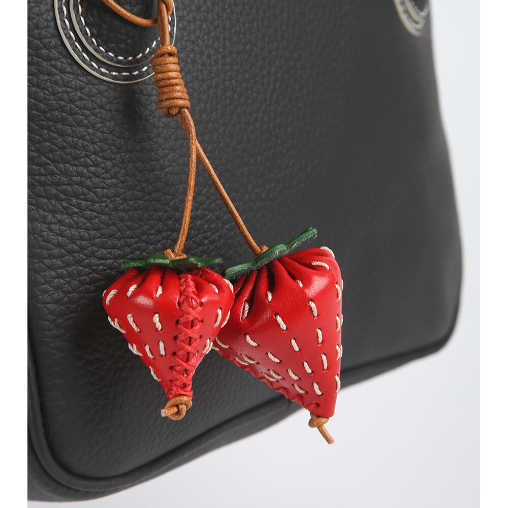 Handmade veg-tanned leather bag charm with strawberry pendant for women