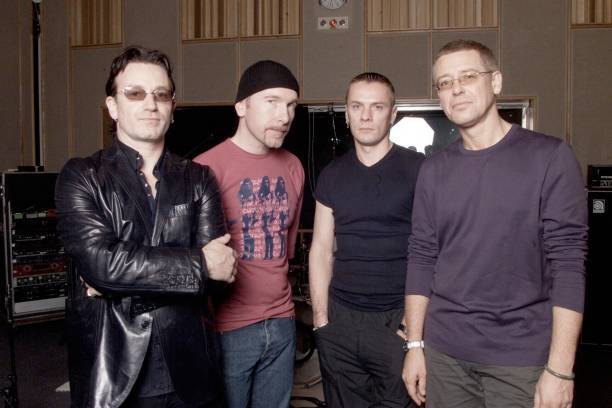 Members Bono The Edge Larry Mullen Jr And Adam Clayton pose for ph- Old Photo-image