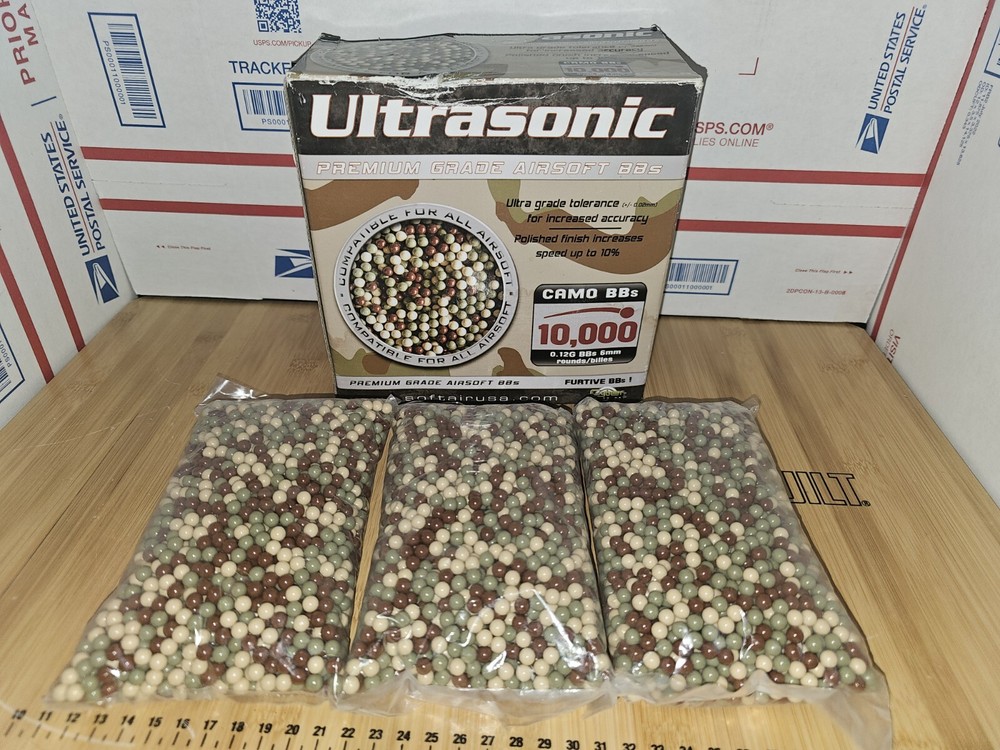 READ DESCRIPTION Ultrasonic 10,000 Camo BBs 6mm Airsoft .12G  (MISSING ONE BAG)