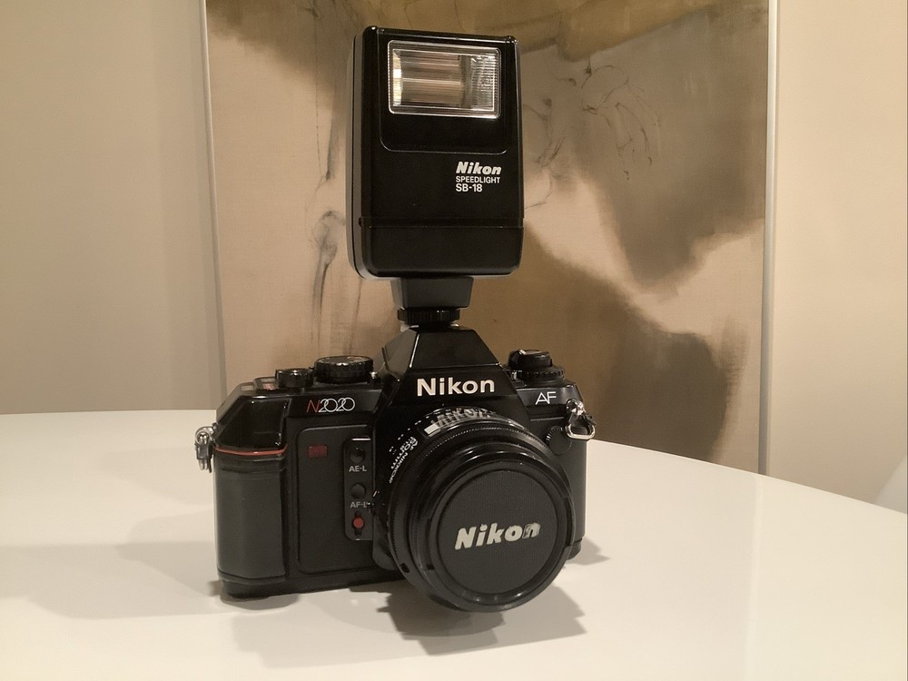 Nikon N2020 35mm Film Camera with 50mm 1:1.8 AF Lens And SB-18 SpeedLight Flash.