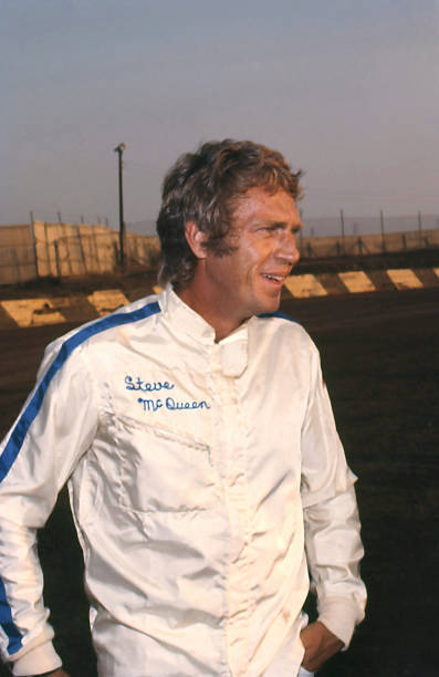 Steve McQueen wearing a personalized racing driver jacket at a rac- Old Photo