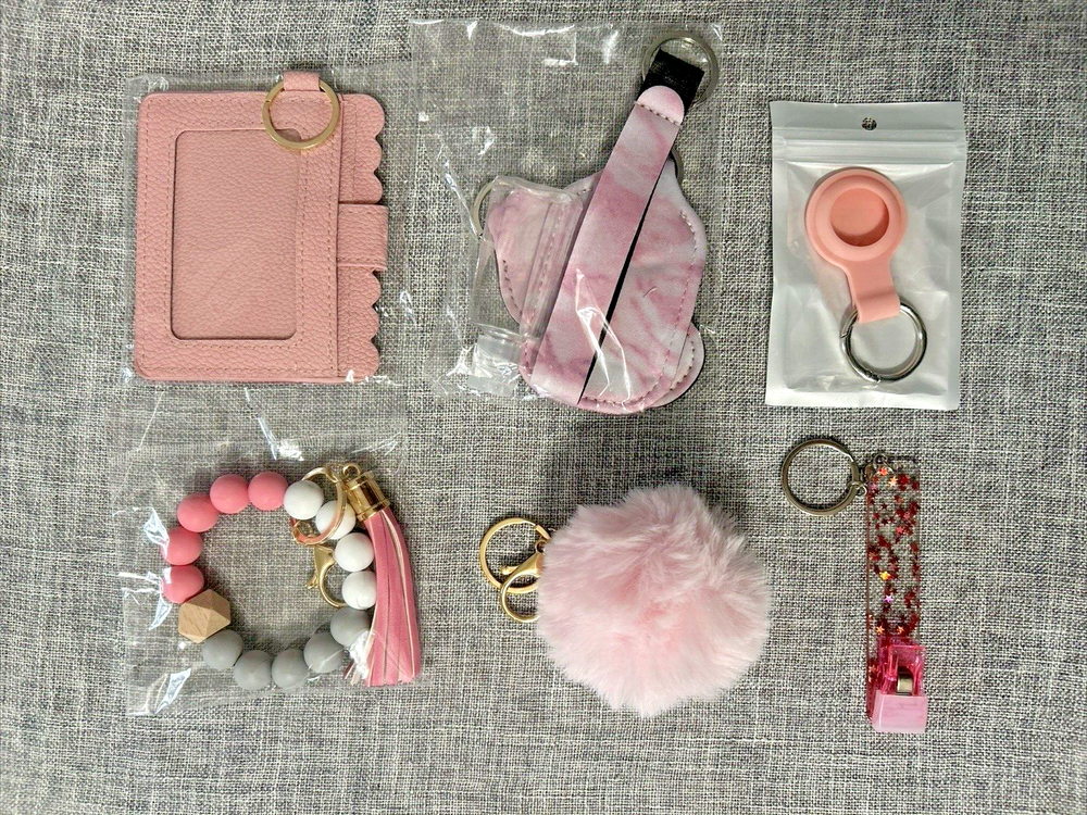 Pink Travel Wristlet with Detachable ID Holder AirTag Case and Pom Keychain