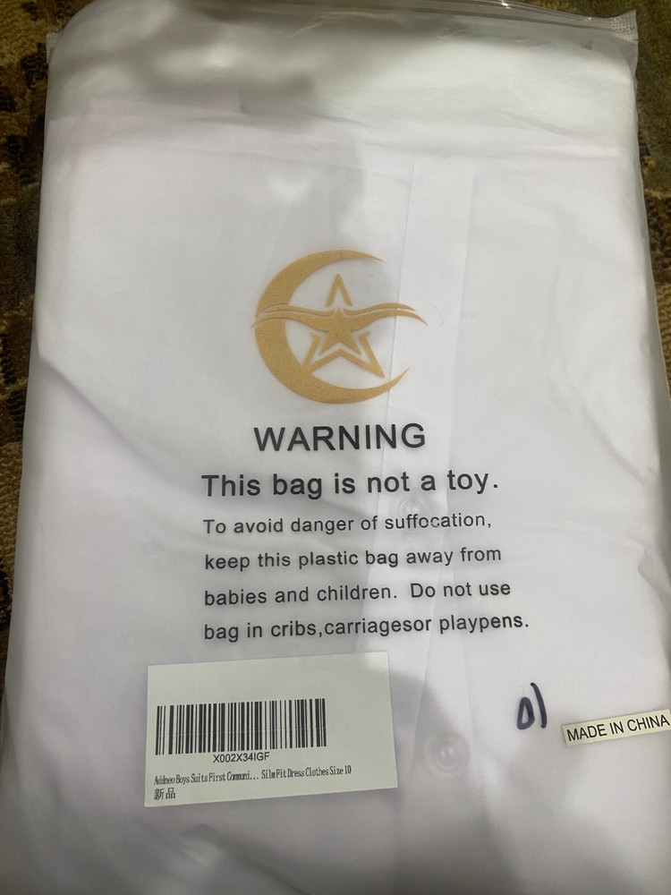 White suit, made by YuanLu, size 10, very lightly worn, for formal events.