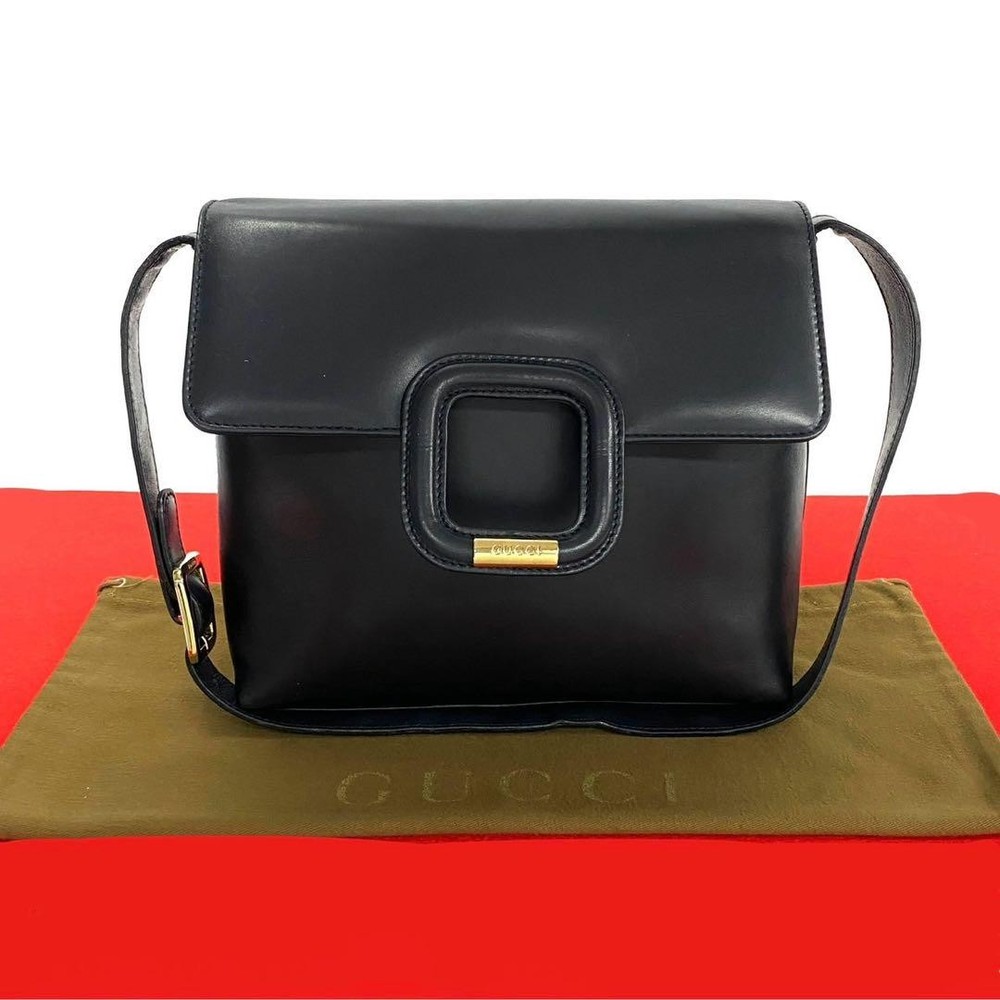 Vintage Gucci navy leather semi-shoulder bag with iconic logo