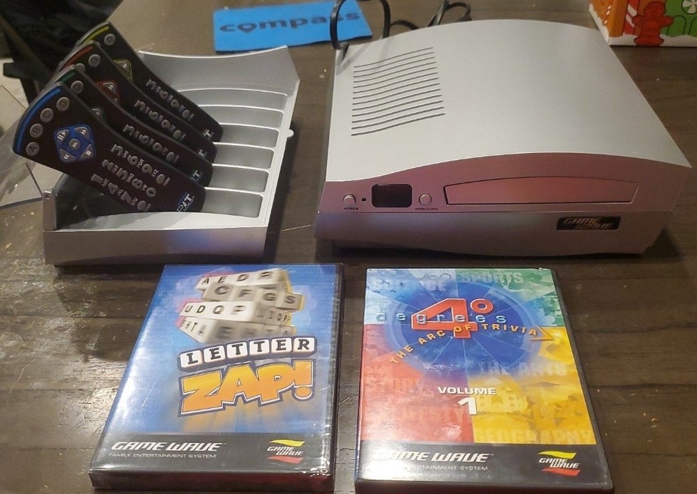 Vintage Game Wave Family Entertainment System w/ 4 remotes and case, and 2 games