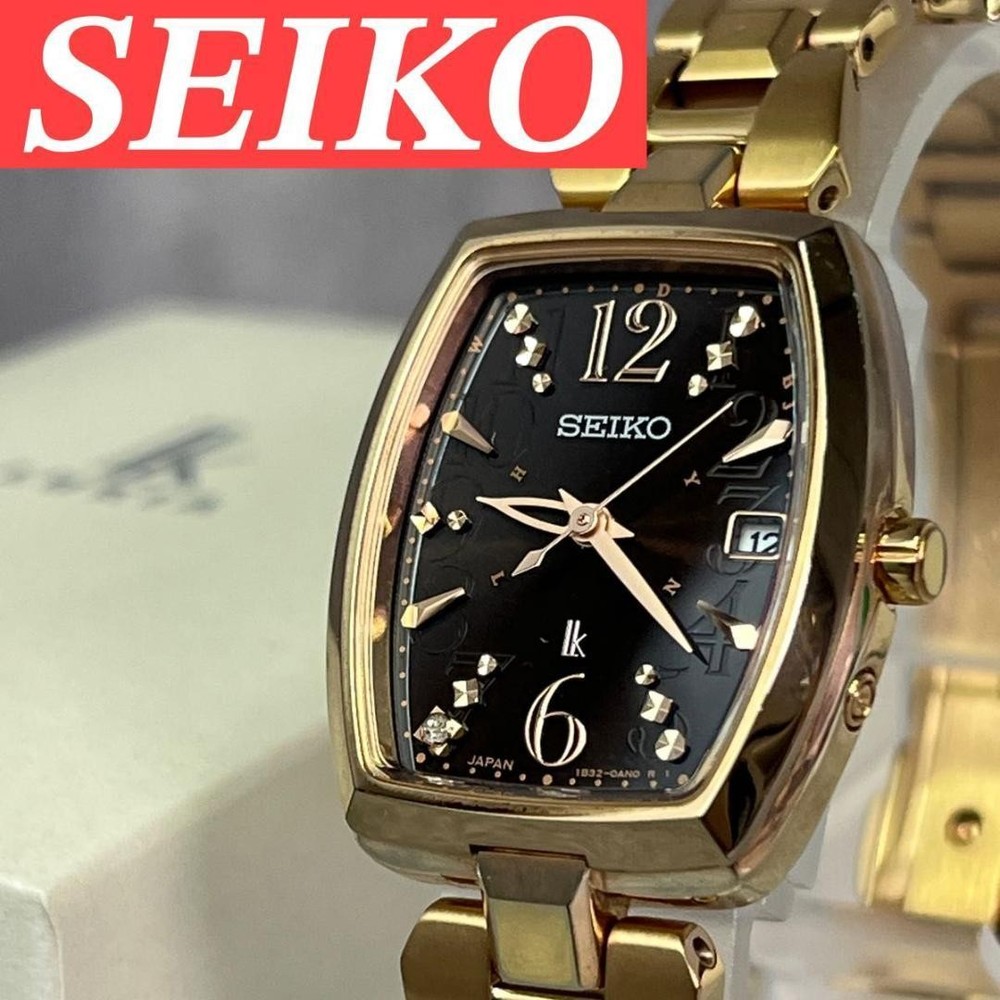 Seiko LUKIA SSVW128 Women's Solar Radio Diamond Tonneau Watch Gold/Black
