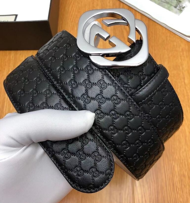 Classic Gucci men's black embossed leather belt with silver buckle size 40