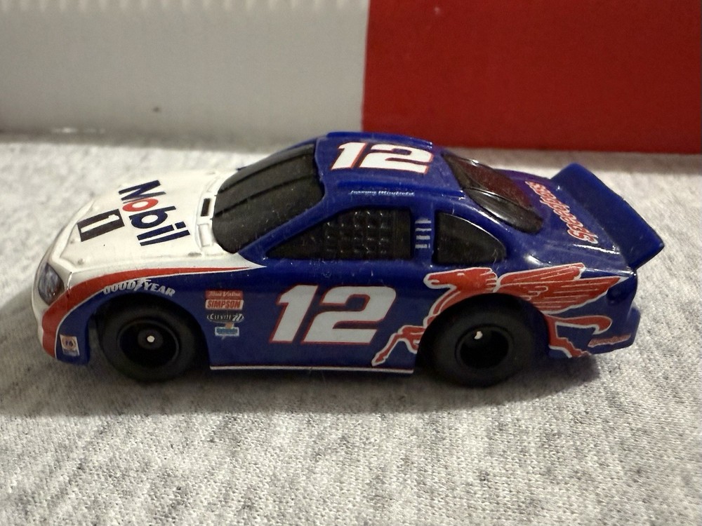 Tyco J Mayfield Mobil 1 Slot Car with Red Stripes on Front Wheels