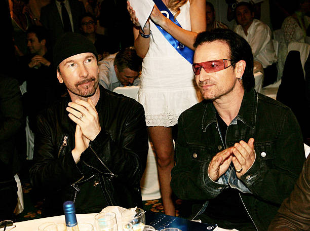 Members The Edge Bono attend the Nordoff Robbins Silver Clef Award- Old Photo 1-image