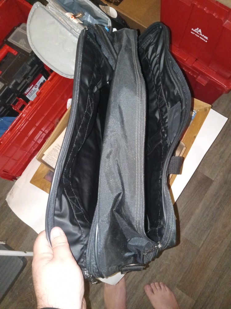 Stylish Black Soft Carry-On Bag with Zippers and Convenient Front Pockets