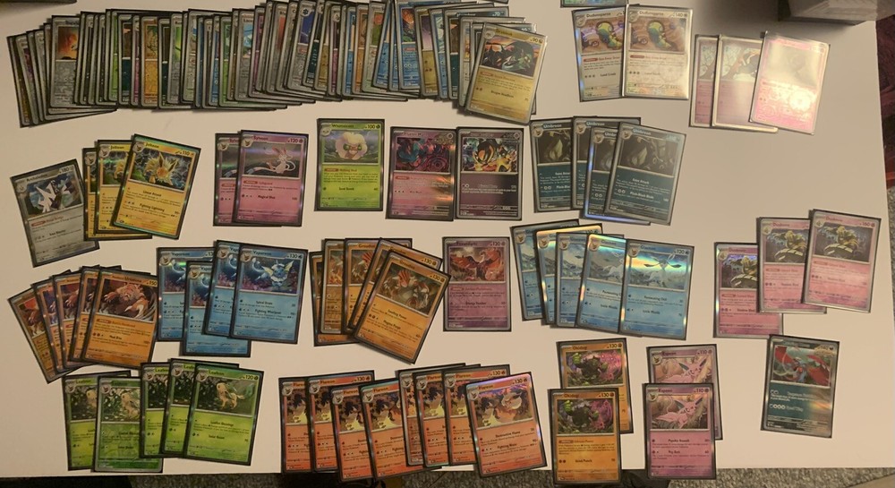 Pokemon Prismatic Evolutions Lot - 59 Rare Holo & Reverse Holo Cards - 49 Holos Included
