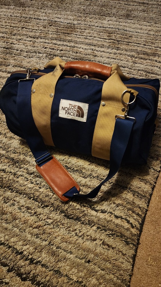 The North Face Vintage Navy Blue Duffle Bag with Shoulder Strap Brown Label EUC USA