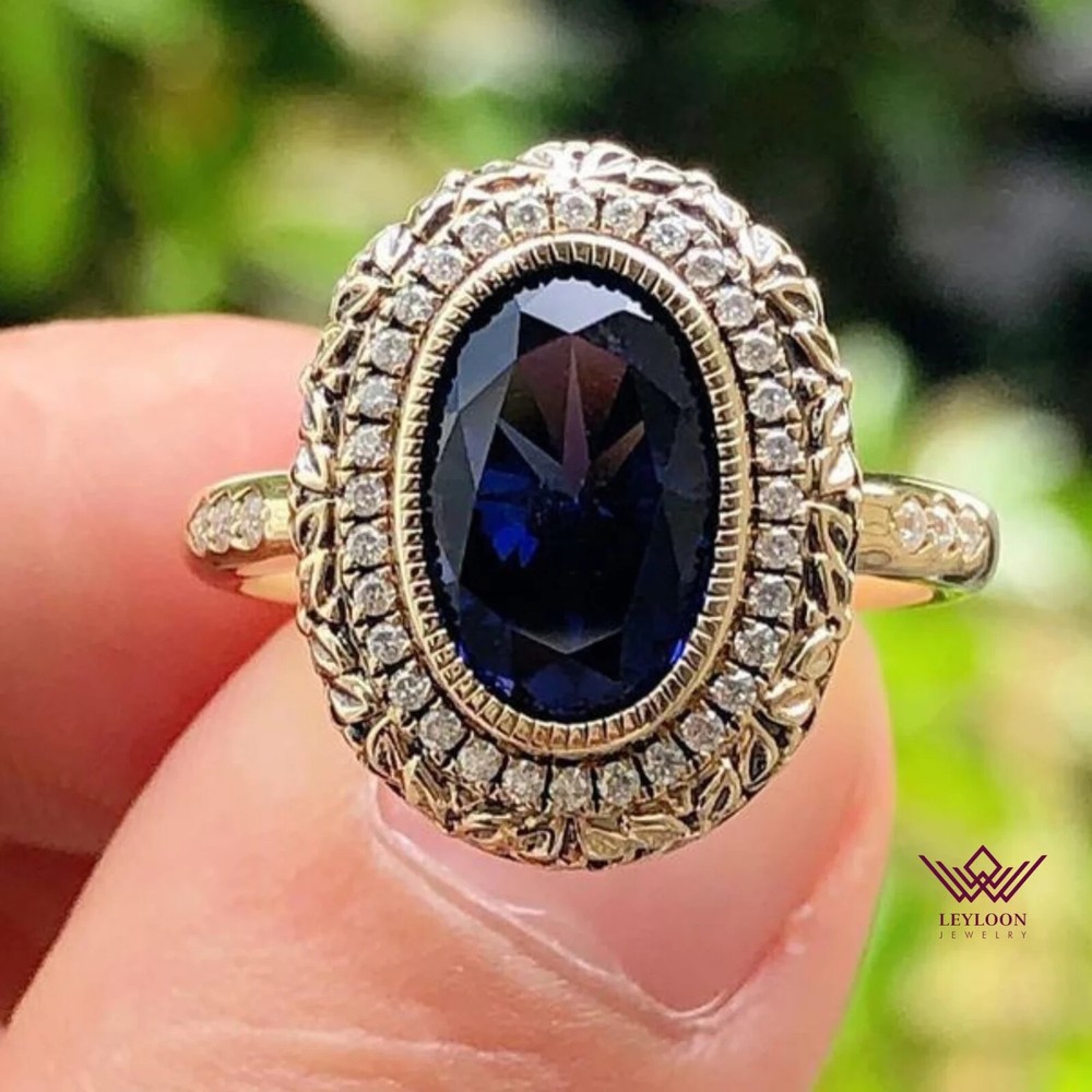 8x12mm Oval Blue Triple Halo VVS Lab Sapphire 18K Gold Ring