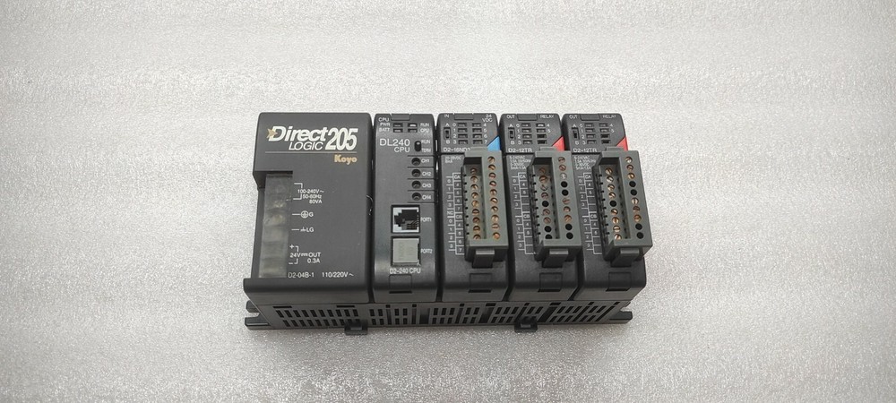 KOYO DIRECT LOGIC 205 PLC D2-04B-1 PS D2-240 CPU D2-16ND3-2 IN D2-12TR OUT