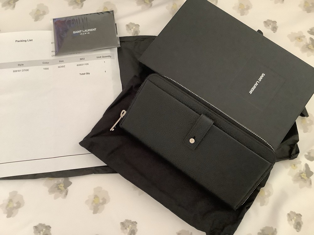 Yves Saint Laurent zip-around wallet 7.5x3.75x1 inches