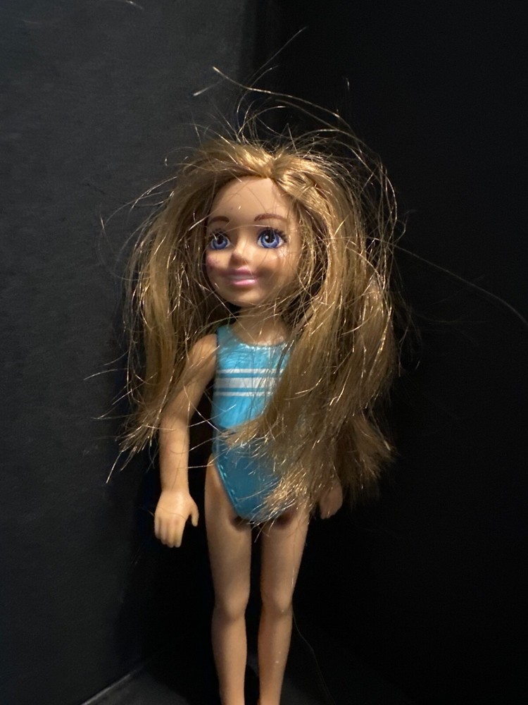 Kid Barbie doll in blue bathing suit with blonde hair and blue eyes great doll.