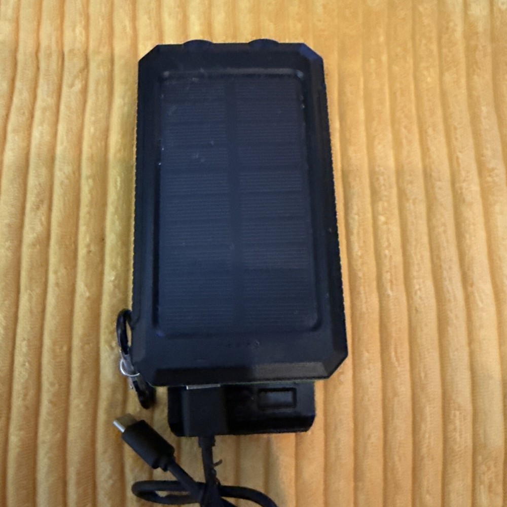 Solar Power Bank with Built-in Compass and Flashlight for Outdoor Adventures