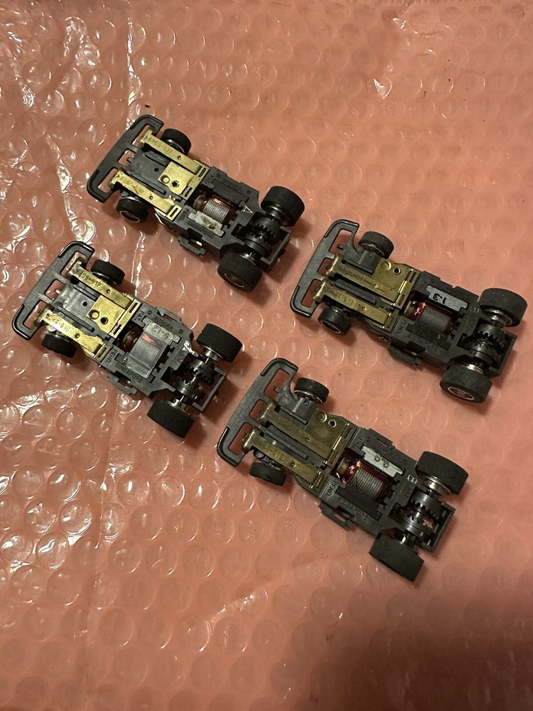 afx aurora ho slot car chassis (4) speed steer lot with side tabs w/correct p/up