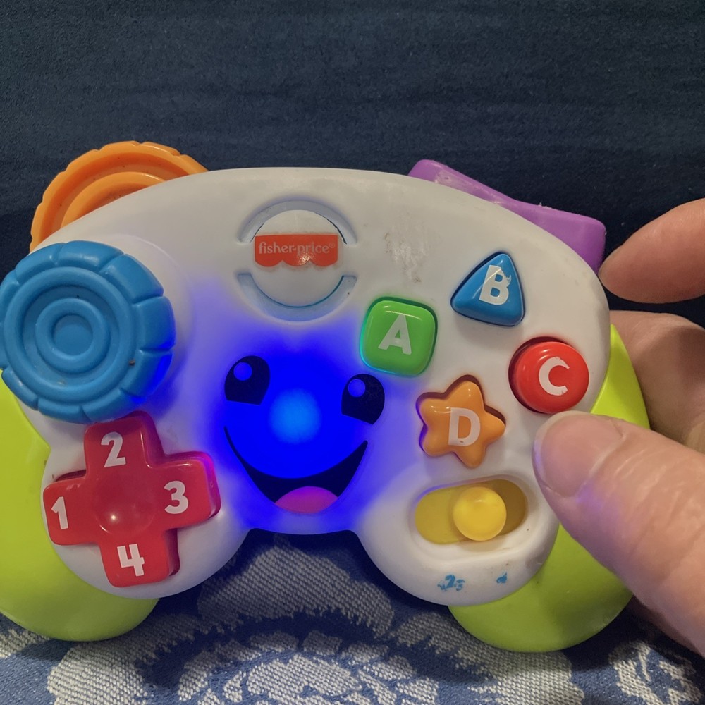 Fisher-Price Laugh & Learn Game & Learn Controller Musical Baby Toy with Lights