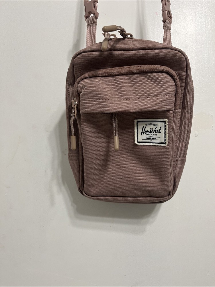 Herschel Supply Co Pink pastel crossbody bag.