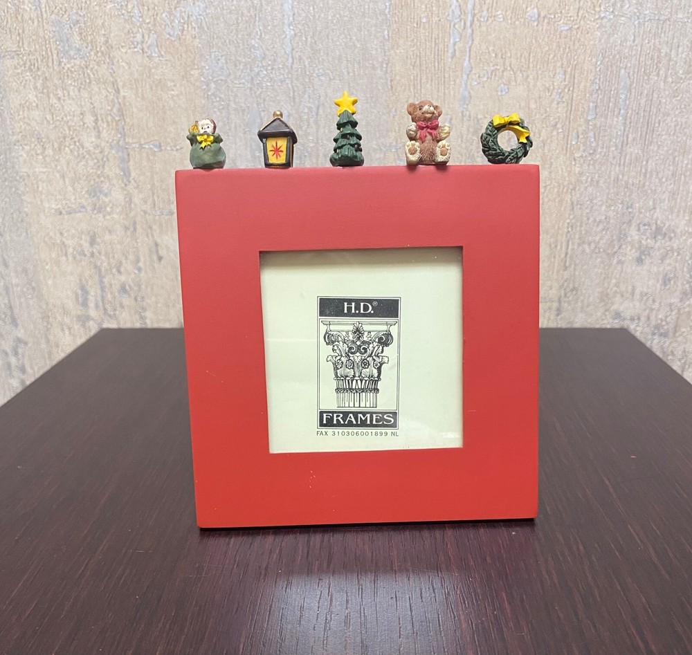 Red Little Picture Frame with Christmas Toys on Top